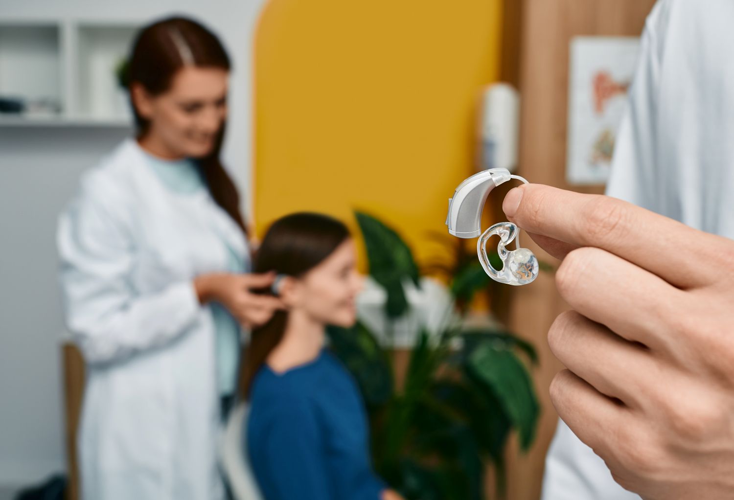 holding uphearing aid